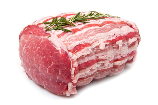 raw meat with rosemary