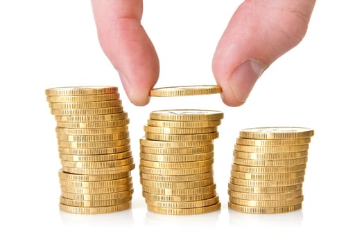 Hand putting golden coins  on white background