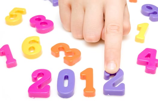 hand and numbers shows future year 2012