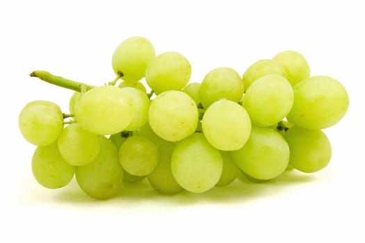 Green grapes on white background close up shoot