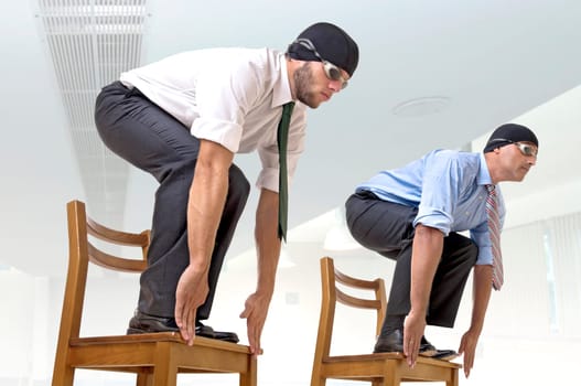 Businessmen with swimming gear ready to dive