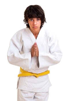 Young fighter posing against a white background