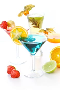 Party cocktails and longdrinks garnished with fruits