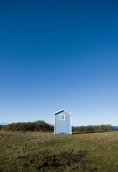 Single boathouse on a sunny day