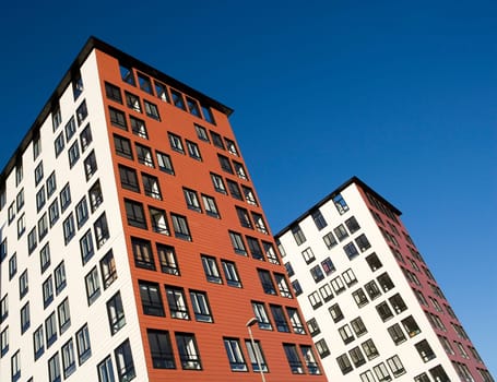 Orange Building Exterior towards Blue sky