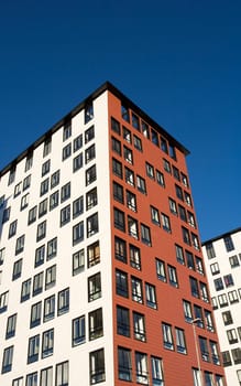 Orange Building Exterior towards Blue sky