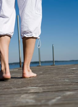Walking barefoot on the Pier