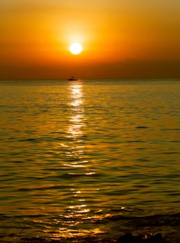 golden dawn in the waters of the Mediterranean in Barcelona