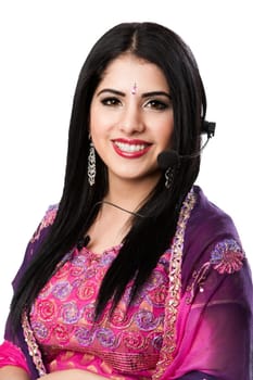Beautiful Happy Indian Hindu Business Customer Service Representative at call center with headset microphone, isolated.