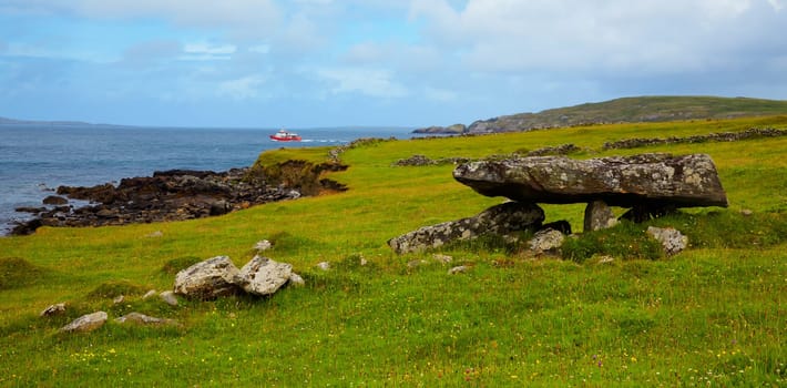 Panoramic landscape of the megalithic tomb near Sellerna beach, Cleggan, Ireland.