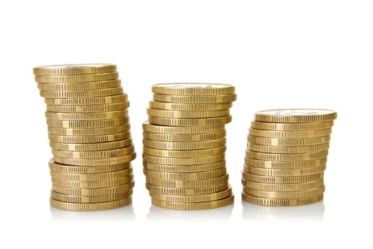 three stacks of coins over a white background
