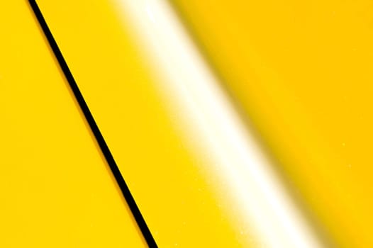 bright yellow glittering vehicle panel abstract