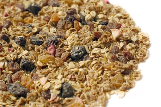 close-up of fruit and nut muesli on white