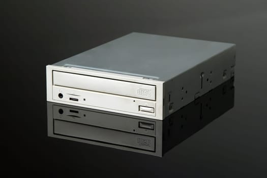internal CD-ROM drive on black reflective background