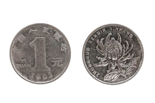 Two metal coins in denomination of one yuan, with different sides lie on a white isolated background, top view.