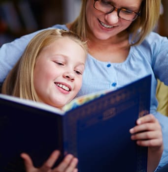 Reading, books and mother with girl in library with smile, help learning and relax with study knowledge. Storytelling, happy mom and child in bookstore together with story, fantasy and education