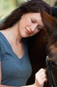 Love, nature and young woman with her horse on an outdoor farm for sports racing. Smile, happy and confident female person from Canada with her equine animal or pet in countryside ranch for adventure.