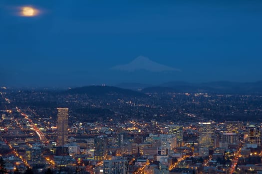Full Moon Rising Over Portland Oregon Cityscape and Mount Hood at Blue Hour