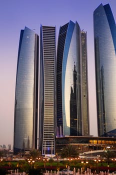 Skyscrapers in Abu Dhabi at dusk, United Arab Emirates