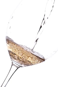 Wine is poured into a wine glass