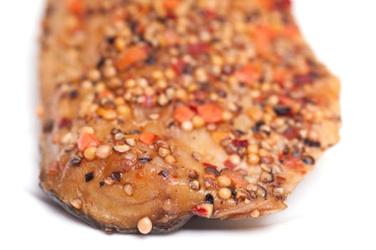 Smoked mackerel with pepper on a plate