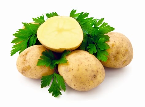 Fresh potatoes with parsley isolated on white background