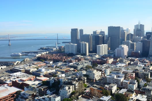 view on City of San Francisco with skyscrapers and bridge