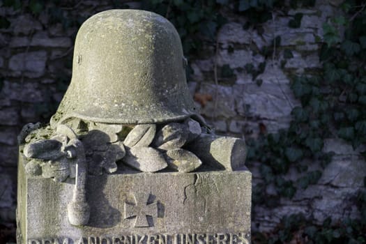 Gravestone with steel helmet in Detmold