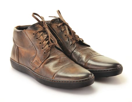 A pair of man&#039 s leather shoes isolated on white