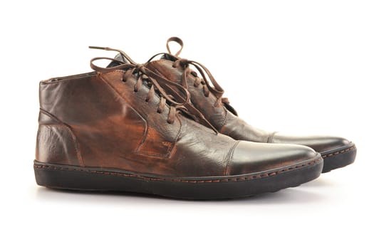 A pair of man&#039 s leather shoes isolated on white