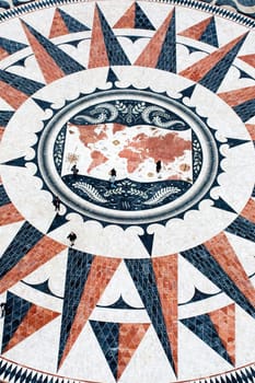 Giant sized compass drawn on the ground nearby Lisbon Discoveries monument