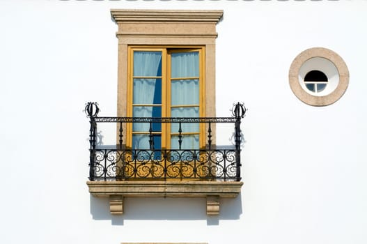 Window and balcony at a traditional house at Alentejo