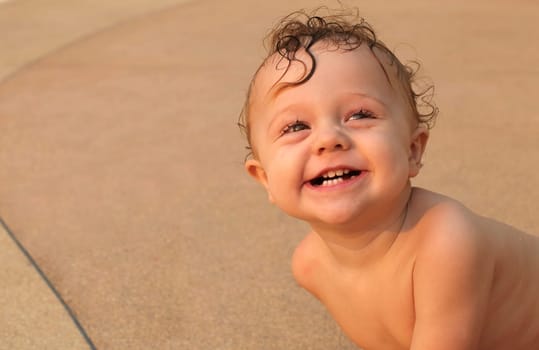 happy the child looks into the camera