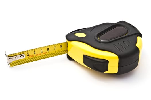 Yellow tape measure closeup on white background