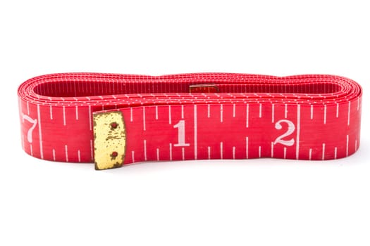 Tape measure closeup on white background