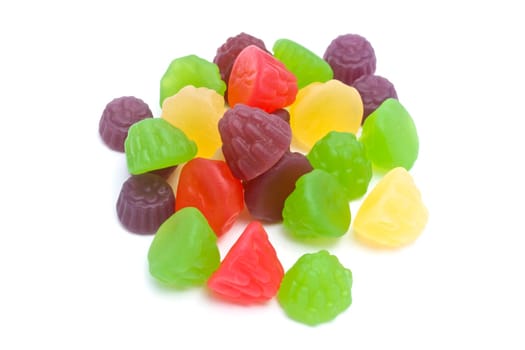 Colorful fruits candy closeup on white background