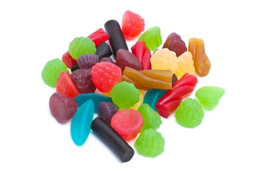 Colorful fruits candy closeup on white background