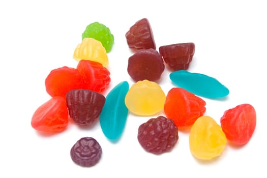 Colorful fruits candy closeup on white background