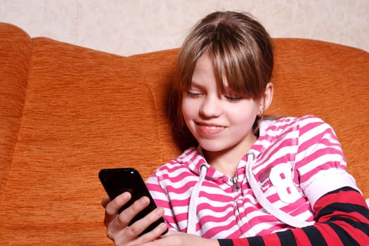 girl play games on her Touchscreen Phone