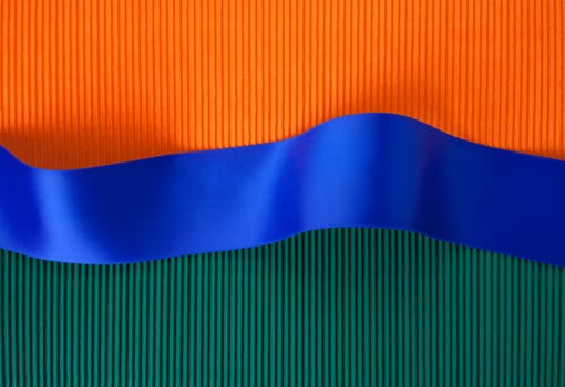 Blue ribbon banner on corrugated cardboard
