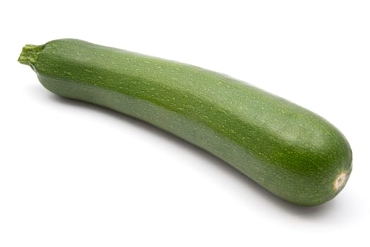 green zucchini closeup on white background
