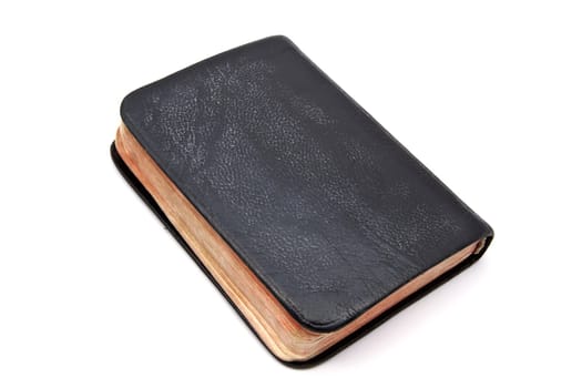 Black book closeup on white background