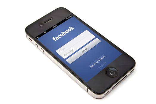 Facebook login page display on Apple iPhone screen