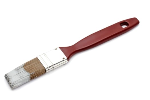 Paintbrush closeup on white background
