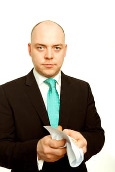 Business man crumples white blank page of paper