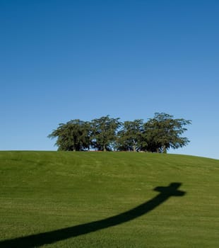 Cross shadow in the grass