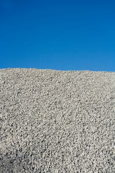 Stack of Gravel towards Blue sky