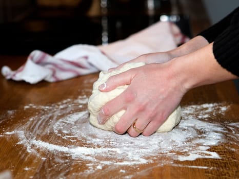 Close up of a woman Kneading Dough