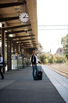 Travelling Woman at the Train Station