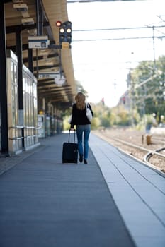Travelling Woman at the Train Station